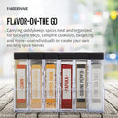 Clear plastic Farberware BBQ Slim Spice Set featuring six labeled compartments containing cumin (ground), granulated garlic, chopped onion, paprika (ground), ground black pepper, and fine sea salt, all neatly organized in a slim, clear holder with black lids.