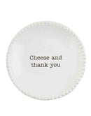 Textured ceramic tapas plate with witty saying displayed on a white background.