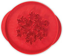 Red Nordic Ware reversible pie top cutter with leaf design, shown on a white background.