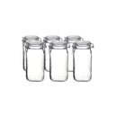 Six empty clear glass Bormioli Rocco Fido canning jars, each with a metal wire latch and an airtight lid.