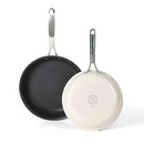 Martha Stewart Lockton set of two aluminum frying pans, one 10-inch with a dark non-stick interior and a stainless steel handle, and one 12-inch with a light-colored cooking surface and a stainless steel handle.