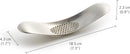 Joseph Joseph stainless steel garlic rocker crusher with curved design shown on a white background.