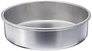 Nordic Ware 9-inch round aluminum cake pan with embossed grid texture, displayed on a white background.