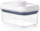 Compact 0.5 qt OXO POP container with clear sides and white lid, shown sealed and filled with sugar cubes on a white background.