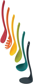 Colorful 5-piece Joseph Joseph kitchen utensil set stacked vertically on a magnetic storage stand, shown on a white background.