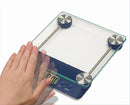 Blue digital kitchen scale with touchless sensor on a white background.