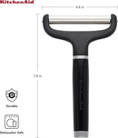 KitchenAid black cheese slicer with stainless steel wire and ergonomic handle on a white background.