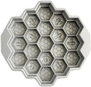 Nordic Ware toffee-colored honeycomb pull-apart Bundt pan with hexagonal cake molds on a white background.