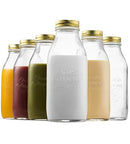 Set of six clear 33.75 oz Bormioli Rocco Quattro Stagioni bottles with embossed fruit and vine design, shown filled partially with colored liquids on a white background.