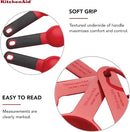 Empire Red KitchenAid measuring cup and spoon set, 9 pieces, displayed on a white background.
