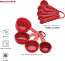 Empire Red KitchenAid measuring cup and spoon set, 9 pieces, displayed on a white background.