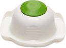 Green handheld Farberware mandoline slicer with stainless steel blade on a white background.