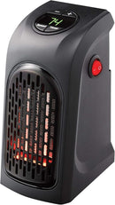 Ontel Handy Heater Deluxe plug-in personal heater with digital display and remote, shown against a white background.