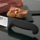  A close-up view of the Fibrox Pro knife’s black non-slip handle, designed for a secure and comfortable grip.