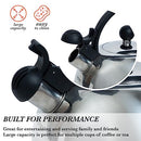 Chrome stainless steel whistling tea kettle with black handle on a white background.
