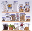 Clear glass Fido jar with a dark blue plastic lid insert and a metal wire clamp closure.