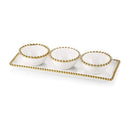 White porcelain serving platter with three round bowls, each adorned with an elegant gold beaded trim.