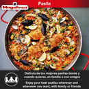 Top view of a fully prepared paella in the Magefesa pan, garnished with seafood, vegetables, and lemon wedges.