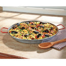 A beautifully plated paella cooked in the MAGEFESA® pan, placed on a rustic kitchen countertop.