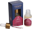 Trapp No. 24 Wild Currant Diffuser Oil featured next to a decorative ultrasonic diffuser with cut-out lighting, enhancing a cozy atmosphere.