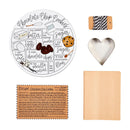 Mud Pie Chocolate Chip Cookie Set featuring a round ceramic recipe plate illustrating ingredients, a printed recipe card, a roll of baker's twine, a silver heart-shaped cookie cutter, and kraft paper bags.