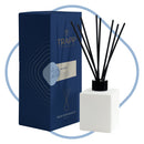 Trapp No. 20 Water 4 fl. oz. Reed Diffuser Kit featuring a sleek white square glass bottle with black reeds, displayed next to its navy and light blue packaging.