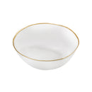 A clear glass bowl with a slightly irregular shape, featuring a delicate hand-applied gold rim. The elegant and minimalist design makes it perfect for serving salads, fruits, or decorative use.