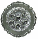 A silver-plated Passover Seder plate featuring an ornate floral border and six engraved indentations for the symbolic Seder items.
