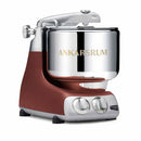 Premium Ankarsrum Original kitchen machine with a stylish red base and large, polished stainless steel mixing bowl, ideal for baking and food preparation. This durable stand mixer features chrome accents and a front control panel with two dials for easy operation.