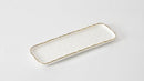 A minimalist presentation of the tray on a white surface, emphasizing its elegant aesthetic.