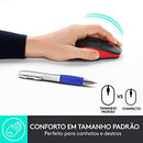 Hand using the wireless mouse with size comparison to a pen