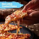 Close-up of cheesy pizza slice being lifted off the hot plate