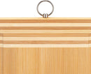 Medium rectangular bamboo cutting board with drip edge on a white background.