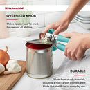 Teal handled KitchenAid can opener with a silver cutting mechanism and bottle opener.