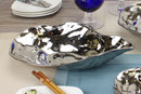  A medium-sized Pampa Bay oyster bowl made of white porcelain with a textured, organic shape.