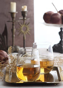 Clear, stemless wine glass with a rounded bowl shape