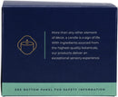 A close-up of the side of a dark blue box with a light green bottom edge, featuring a gold outline illustration of a burning candle. To the right, white text reads: "More than any other element of décor, a candle is a sign of life. With ingredients sourced from the highest-quality botanicals, our products deliver an exceptional sensory experience." Below this, in smaller white text, it states: "SEE BOTTOM PANEL FOR SAFETY INFORMATION".