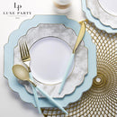gold-accented scalloped plastic plates in ice blue