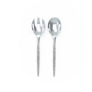 White and silver glitter plastic serving fork and spoon set displayed on a white background.
