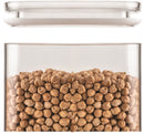 Glass storage container filled with dried chickpeas, featuring an airtight transparent lid. Ideal for kitchen organization and pantry storage. 