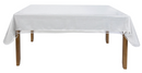 A Home Details Crystal Clear Tablecloth Protector is displayed on a wooden table, showcasing its transparent vinyl and reusable clear table protection.