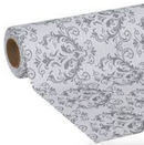 A partially unrolled roll of shelf liner featuring a light gray and white damask pattern.