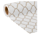 A partial roll of white shelf liner with a repeating gold quatrefoil pattern, unwinding slightly to reveal the brown cardboard core. The texture appears to be somewhat ribbed or subtly textured on the white background.