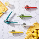 Chef'n FreshForce Lemon Squeezer in white and chrome, designed for maximum juice extraction from citrus fruits.