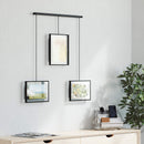 A modern black frame photo display featuring three frames suspended from a horizontal bar by thin rods.