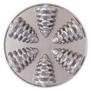 Silver Nordic Ware cakelet pan featuring small fir tree molds, displayed on a white background.