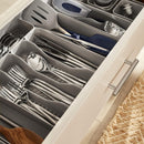 Silver-colored utensil tray for drawers, by Spectrum Diversified, designed to keep silverware and kitchen tools neatly organized.