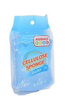 A light blue rectangular cellulose sponge is displayed next to its light blue and white packaging. The packaging features the "Kosher Cook" logo, "CELLULOSE SPONGE," and "DAIRY" labels.