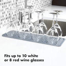 Light gray rectangular silicone drying mat with raised ridges for efficient drying.