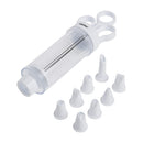 cupcake injector and 8-piece frosting tip set arranged neatly on a white background.
